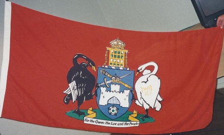 A later version of the red coat of arms flag