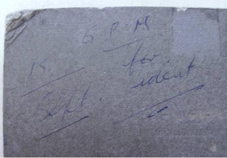 Handwritten note can be found on the top left corner on the back of the photo held by the Legislative Assembly 