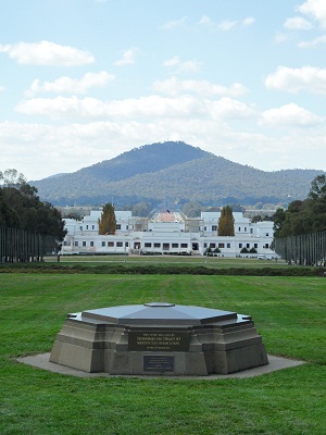 Commencement Column base with Old Parliament House and Mount Ainslie in the background Commencement Column base with Old Parliament House and Mount Ainslie in the background