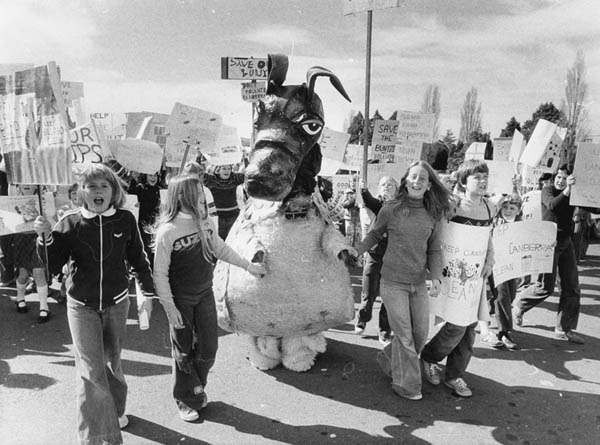 Students and Bunyip march against pollution outside Parliament House
