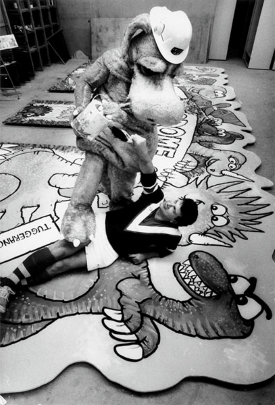 Alexander Bunyip helping Michael Salmon work on a mural for the 1988 Canberra Festival